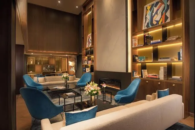 Shared resort evening with a welcoming lounge and dining setting